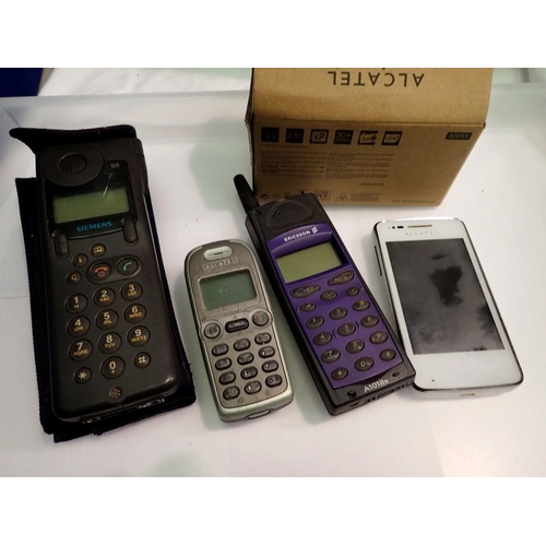 1114A - Four mobile phones including a new boxed example. UK P&P Group 1 (£16+VAT for the first lot and £2+V... 