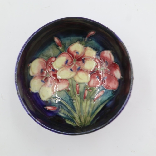 290 - Moorcroft footed bowl, in the Freesia pattern on cobalt blue ground, D: 10.5cm. UK P&P Group 1 (£16+... 