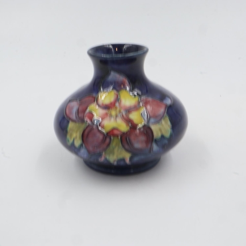 318 - Moorcroft squat vase in the Columbine pattern on cobalt blue ground, H: 7cm. UK P&P Group 1 (£16+VAT... 