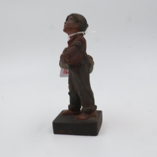 345 - Painted cast iron advertising figure of a newspaper boy, front of plinth marked 'Speshul', believed ... 