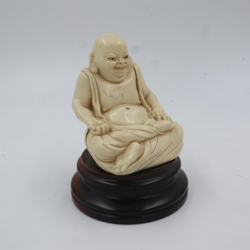 346 - Resin seated figure of Buddha on a turned hardwood base, overall H: 16 cm. UK P&P Group 2 (£20+VAT f... 