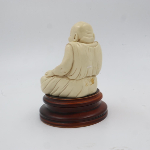 346 - Resin seated figure of Buddha on a turned hardwood base, overall H: 16 cm. UK P&P Group 2 (£20+VAT f... 