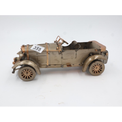 355 - Tin plate racing car, L: 30 cm. UK P&P Group 2 (£20+VAT for the first lot and £4+VAT for subsequent ... 