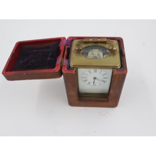 368 - Cased brass carriage clock with key. UK P&P Group 2 (£20+VAT for the first lot and £4+VAT for subseq... 