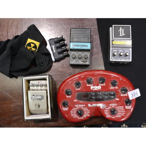 386 - A collection of guitar effects pedals to include a Marshall Jackhammer, Nobel DT-1, Line 6 Pod etc.