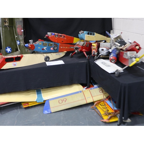 390 - Selection of model aircraft airframes and wings, some fitted with engines including three fourstroke... 