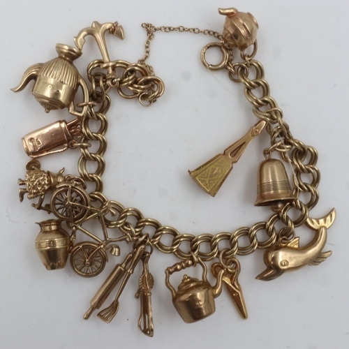 82 - 9ct gold charm bracelet with twelve charms including a bicycle charm, 34.4g. UK P&P Group 0 (£6+VAT ... 