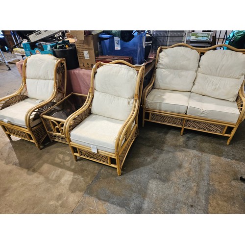 1749A - J. Johnson & Son Wicker conservatory suite. Two seat sofa, 2 chairs and a glass topped table. Not av... 