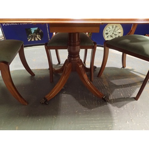 1742 - Extending dining table in yew, good reproduction piece with set of four matching dining chairs and a... 