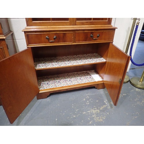 1742A - Reproduction Yew wood and walnut eight drawer pedestal desk with green tooled leather insert to top,... 