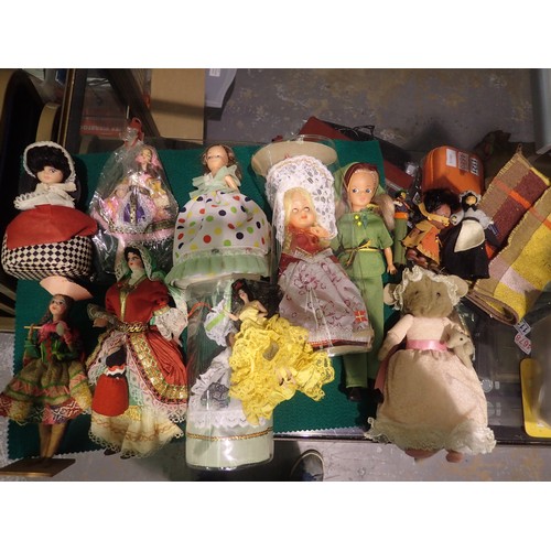 1041 - Twelve toy dolls in varying sizes to include a Sindy Doll. Not available for in-house P&P