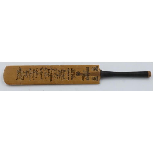 2034 - The Keith Miller autographed miniature cricket bat, New South Wales & Australia.