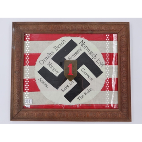 2051 - Memento of a soldier in the US 1st Infantry Division. A German NSDAP Flag centre mounted on a fragme... 