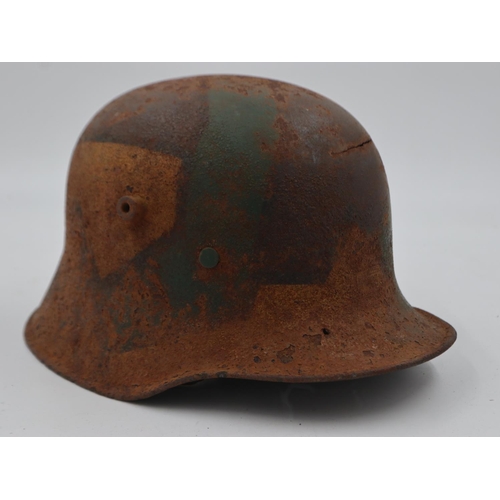 2109 - Imperial German camouflage 1916 model Stahlhelm helmet. No liner. Found in an old farm buildings roo... 