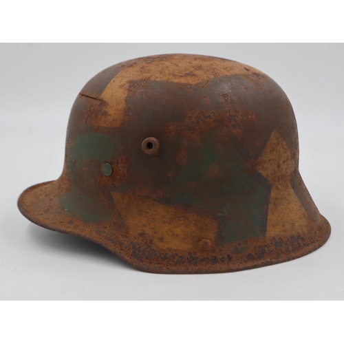 2109 - Imperial German camouflage 1916 model Stahlhelm helmet. No liner. Found in an old farm buildings roo... 