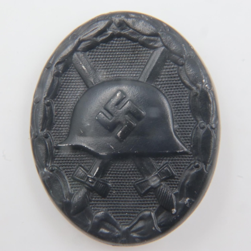 2193 - German pressed metal wound badge in black. UK P&P Group 1 (£16+VAT for the first lot and £2+VAT for ... 