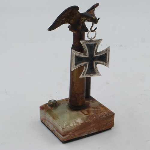 2197 - WWII Iron Cross 2nd Class. Hooked on an eagle-form stand. One of the bullet heads is missing. UK P&P... 