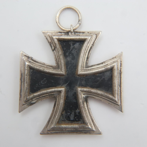 2197 - WWII Iron Cross 2nd Class. Hooked on an eagle-form stand. One of the bullet heads is missing. UK P&P... 