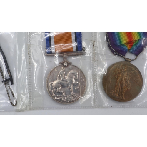 2203 - WWI British Medal Duo with wound stripe and photograph. Medals awarded to 63252 Bombardier H. Cooke ... 