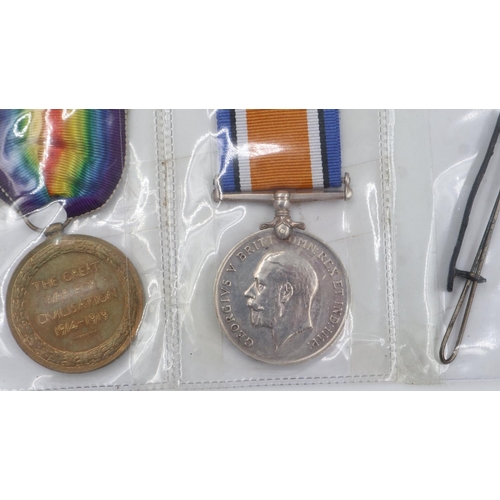 2203 - WWI British Medal Duo with wound stripe and photograph. Medals awarded to 63252 Bombardier H. Cooke ... 