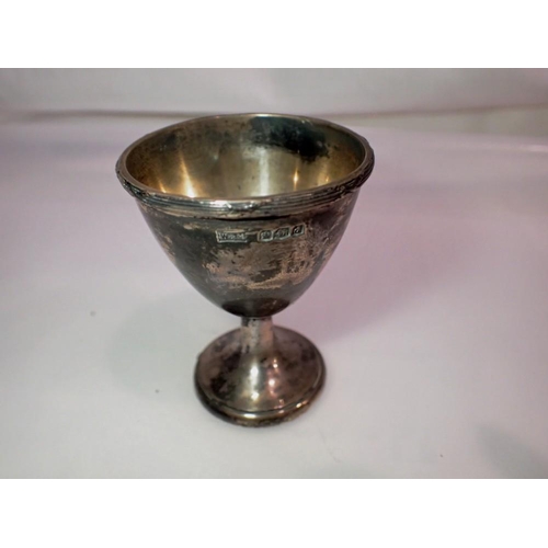 1059 - Heavy hallmarked silver eggcup inscribed Michael, 74g. UK P&P Group 1 (£16+VAT for the first lot and... 