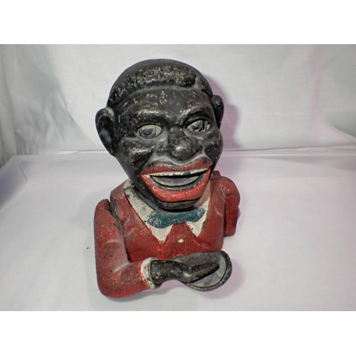 1074 - Cast aluminium 'Jolly Man' money box, H: 16cm. UK P&P Group 1 (£16+VAT for the first lot and £2+VAT ... 