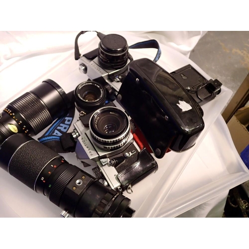 1100 - Praktica B200 cased camera with a 50mm lens with two compact cameras and a cased pair of Miranda bin... 