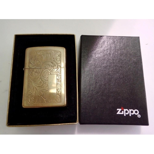 1169 - Unused Zippo brass lighter in original box with foliage decoration and instructions. UK P&P Group 1 ... 