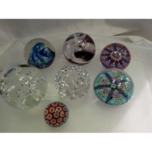 1172 - Collection of seven paperweights including Caithness. Not available for in-house P&P