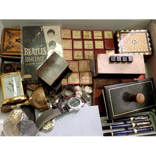 1173 - Tray of collectables including wooden boxes, 36mm film strips, coins, and a The Beatles Guitar Instr... 