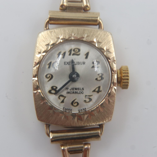 21 - 9ct gold ladies wristwatch, 11g. UK P&P Group 0 (£6+VAT for the first lot and £1+VAT for subsequent ... 