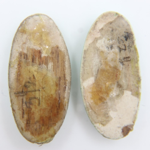 42 - Two oval Ruskin ceramic cabochons, L: 40 mm. UK P&P Group 0 (£6+VAT for the first lot and £1+VAT for... 