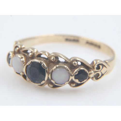 46 - 9ct gold ring set with sapphires and opal, size Q, 2.1g. UK P&P Group 0 (£6+VAT for the first lot an... 