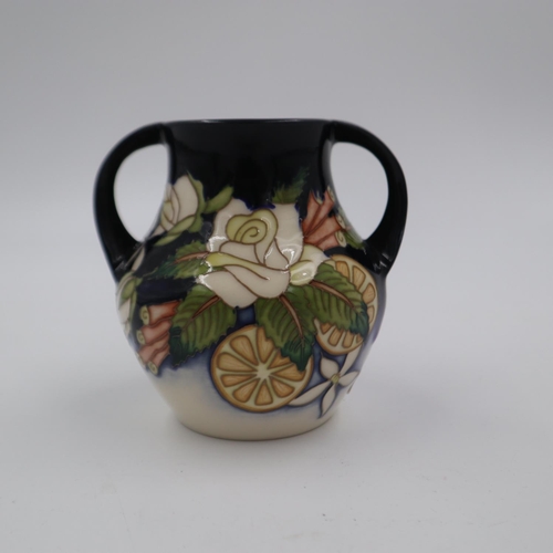 173 - Moorcroft twin handled vase in the Ampulla pattern by Nicola Slaney, no cracks or chips, H: 16 cm. U... 