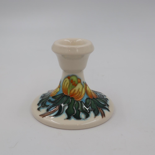 220 - Moorcroft candlestick holder in the Winter Aconite pattern, no cracks or chips, H: 70 mm. UK P&P Gro... 