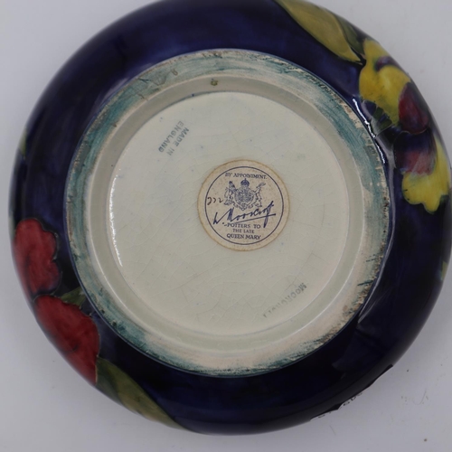 224 - Moorcroft circular lidded box in the Hibiscus pattern, original paper label to base, D: 17 cm. UK P&... 