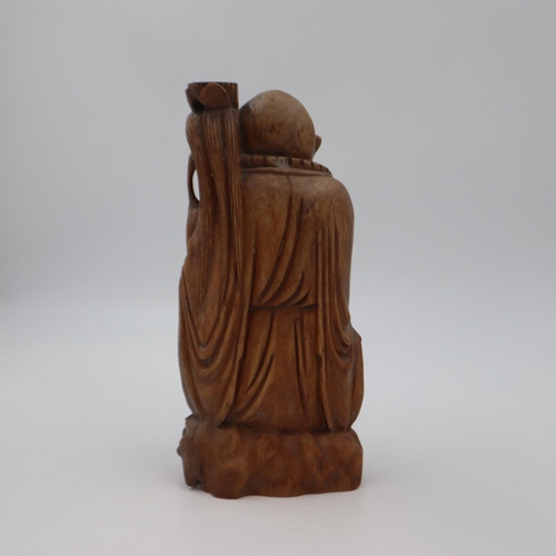 297 - Chinese carved hardwood figure, paper label to base, H: 37 cm. UK P&P Group 3 (£30+VAT for the first... 