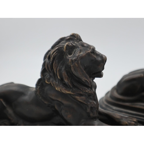 316 - Pair of bronze recumbent lions, on marble stepped bases, after Barrie, L: 29cm. UK P&P Group 3 (£30+... 