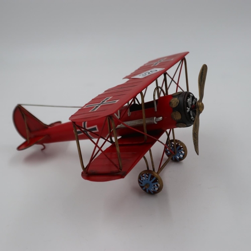 320 - Tin plate Red Baron aeroplane, L: 28 cm. UK P&P Group 3 (£30+VAT for the first lot and £8+VAT for su... 