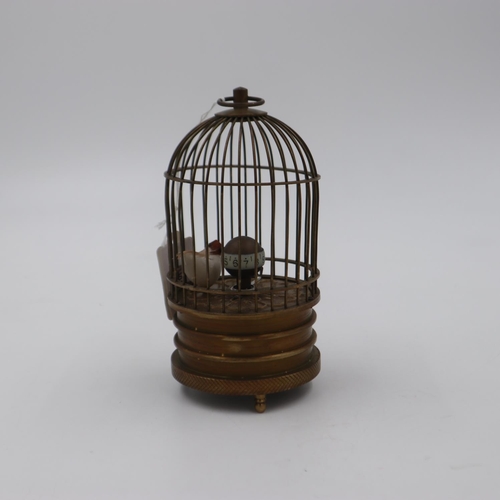 329 - Brass mechanical bird cage clock. UK P&P Group 2 (£20+VAT for the first lot and £4+VAT for subsequen... 