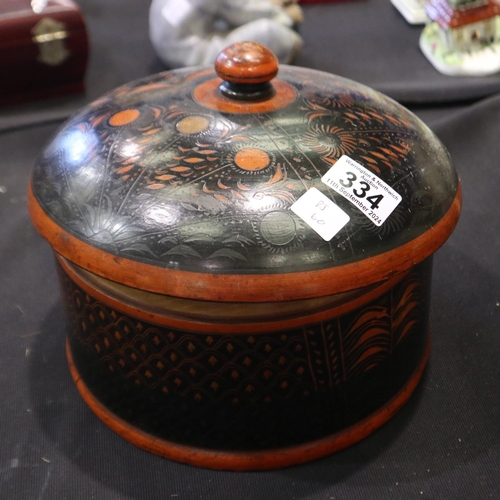 334 - Large wooden African lidded pot with tribal decoration. Not available for in-house P&P