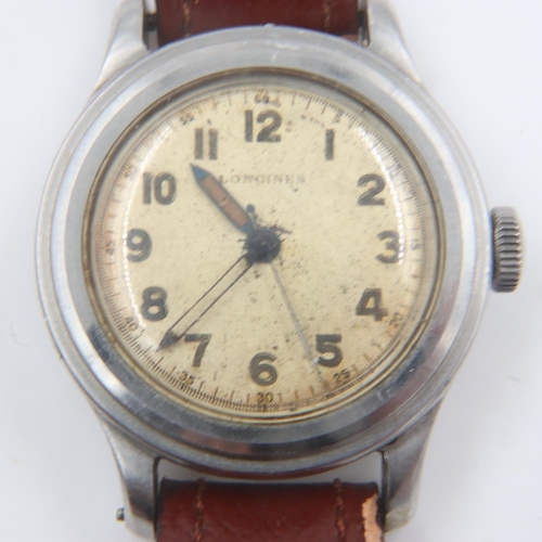 80 - Longines gents 1940's mechanical wristwatch, steel case with Arabic numerals, working at lotting up.... 