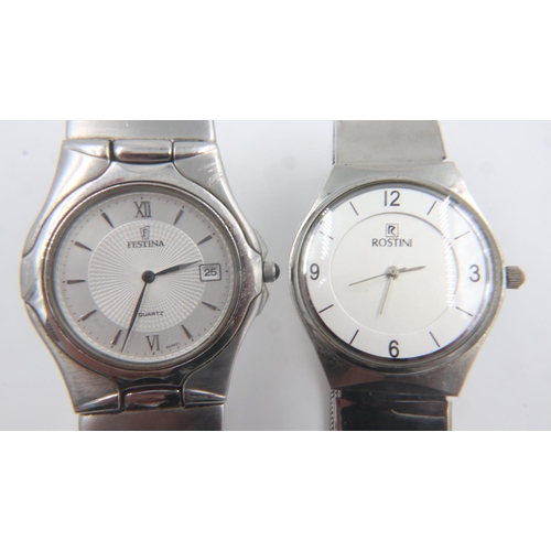 85 - FESTINA: slim profile quartz gents wristwatch, and a similar ROSTINI example, each on steel bracelet... 