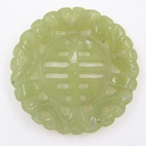 97 - A large carved, polished and reticulated jade amulet. UK P&P Group 0 (£6+VAT for the first lot and £... 