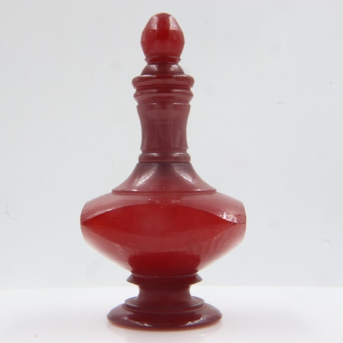 99 - Turned and polished cherry amber snuff bottle, H: 60mm. UK P&P Group 0 (£6+VAT for the first lot and... 