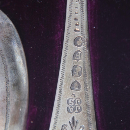 147 - Cased sterling silver fork and spoon together with three cased cutlery sets with silver collars, wei... 