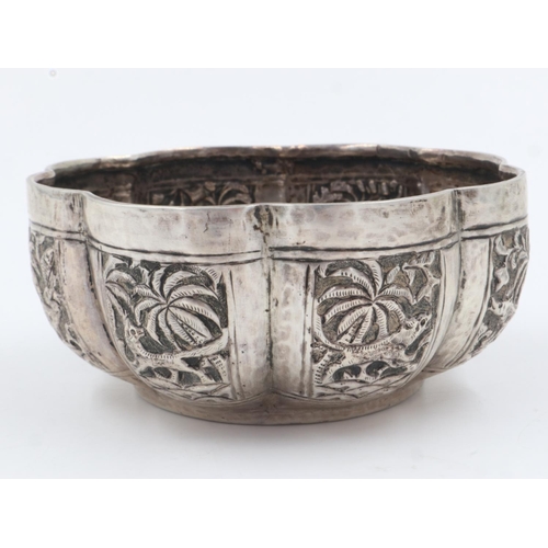 132B - 19th century Raj period Indian silver bowl, the body having designs of palm trees and indigenous ani... 