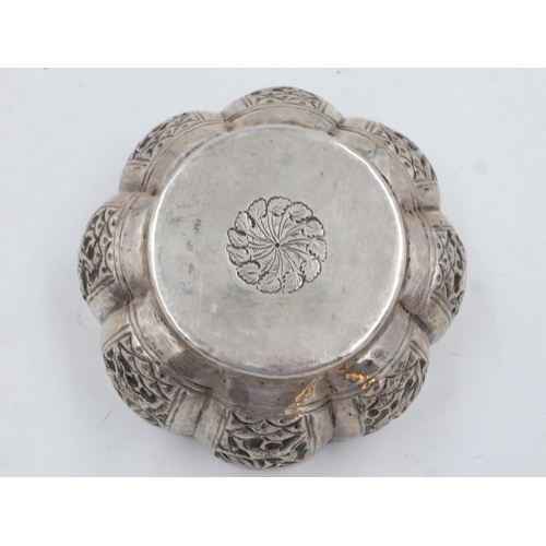 132B - 19th century Raj period Indian silver bowl, the body having designs of palm trees and indigenous ani... 