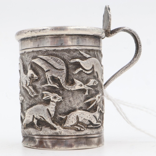 132D - 19th century Raj period Indian silver tankard, the body having designs of sprinting indigenous anima... 