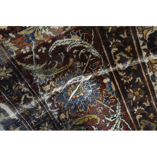 2100 - Distressed 19th century woven silk floor rug with complex floral designs, 180 x 135 cm, split toward... 